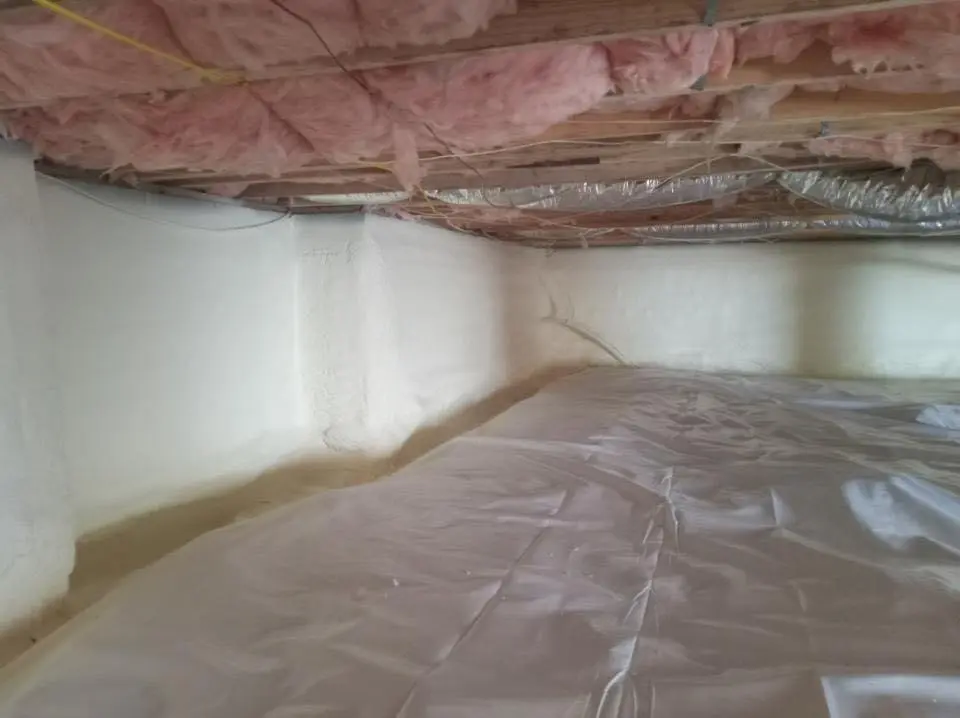 Crawl space encapsulation with closed-cell spray foam for Commercial Roof Restoration in Ravenna